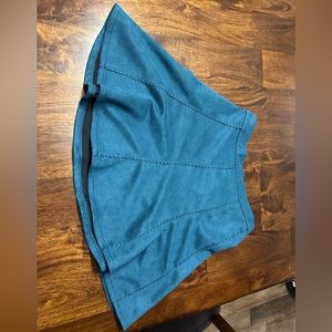 Francesca’s dark teal skirt.